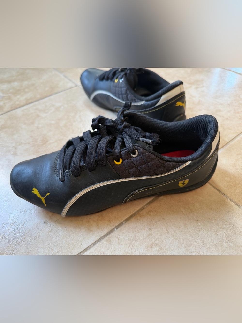 Puma Kids Black Sneakers with Yellow Accent